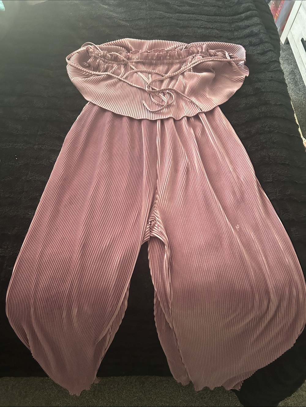 Lavender romper with ties.